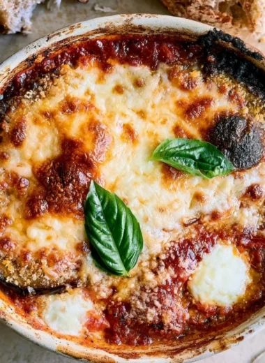 Delicious homemade Eggplant Parmesan layered with cheese and marinara sauce.