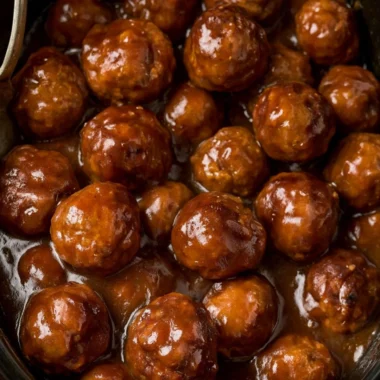 Delicious Slow Cooker Salisbury Steak Meatballs served with rich gravy.