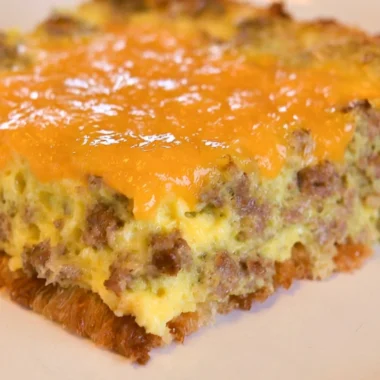Delicious breakfast casserole with eggs, cheese, and vegetables baked to perfection