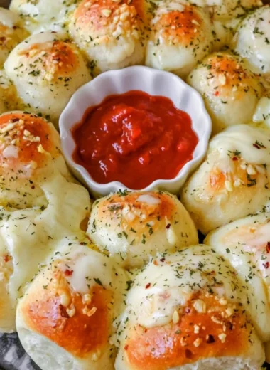 Cheesy garlic monkey bread fresh out of the oven, golden brown and fluffy